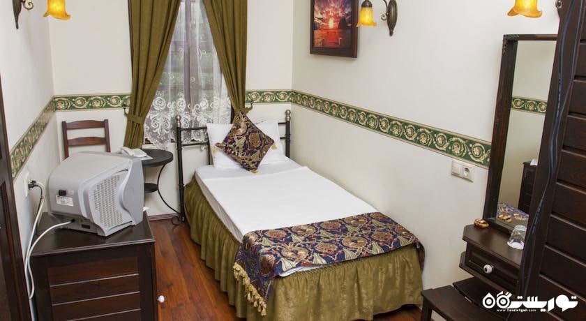 نمایی از تخت اتاق سینگل